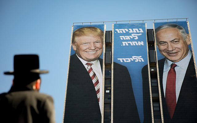 An election campaign billboard of the ruling Likud party reading 'Netanyahu is a different league' shows Israeli Prime Minister Benjamin Netanyahu (R) and US President Donald Trump (L) shake hands at the entrance to Jerusalem.. Photo by: JINIPIX