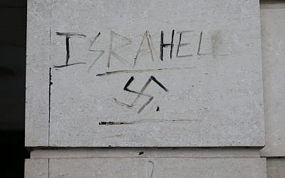 Graffiti saying 'Israhell' next to a swastika on a wall in Victoria, London, as antisemitic incidents rise for a third year in a row. (Photo credit should read: Yui Mok/PA Wire)