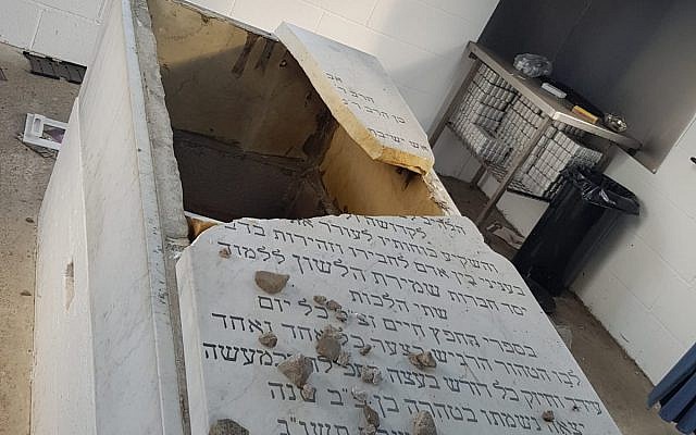 Smashed grave at Jewish cemetery in Prestwich (Shmuli Brown)