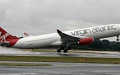 A Virgin Atlantic A330 leaving grey and wet London for sunnier climes A Virgin Atlantic A330 leaving grey and wet London for sunnier climes