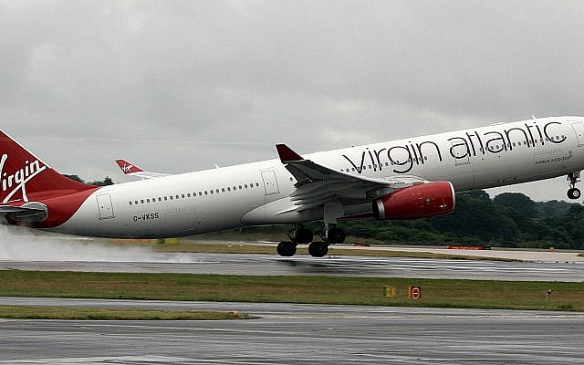 A Virgin Atlantic A330 leaving grey and wet London for sunnier climes