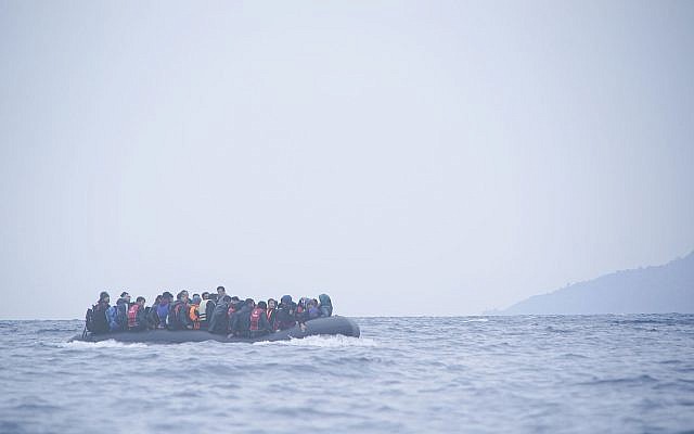 Migrants crossing the Aegean Sea from Turkey to the Greek island of Lesbos, January 2016, on a rubber dinghy .(Wikipedia/Mstyslav Chernov/Unframe)