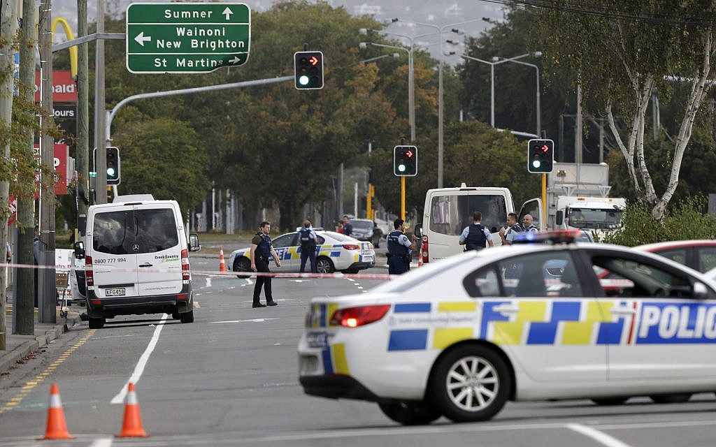 Police block the road near the shooting at a mosque in Linwood, Christchurch, New Zealand, Friday, March 15, 2019. Multiple people were killed during shootings at two mosques full of people attending Friday prayers. (AP Photo/Mark Baker)
