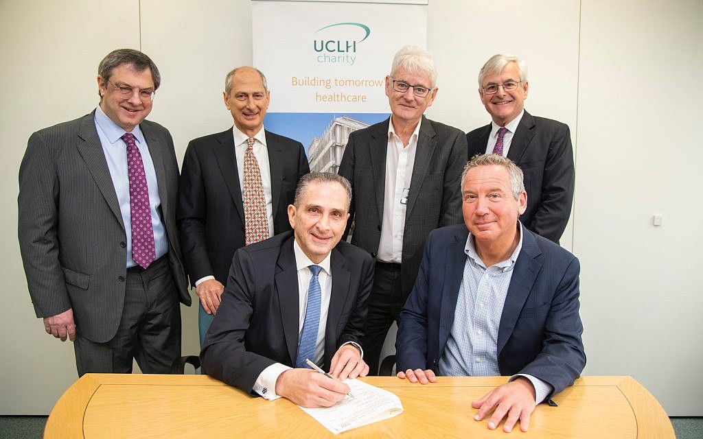 The back row, From left to right  Elie Dangoor, David Dangoor, Professor Geoff Bellingan, medical director, surgery and cancer, Philip Brading, chief executive, UCLH Charity (end, back). Professor Marcel Levi, UCLH NHS Foundation Trust (front), Michael Dangoor, (front left).  (Photographer: Adam Scott)