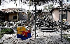 Children's swing among rubble after a house in Israel is struck by a Hamas terror rocket Children's swing among rubble after a house in Israel is struck by a Hamas terror rocket