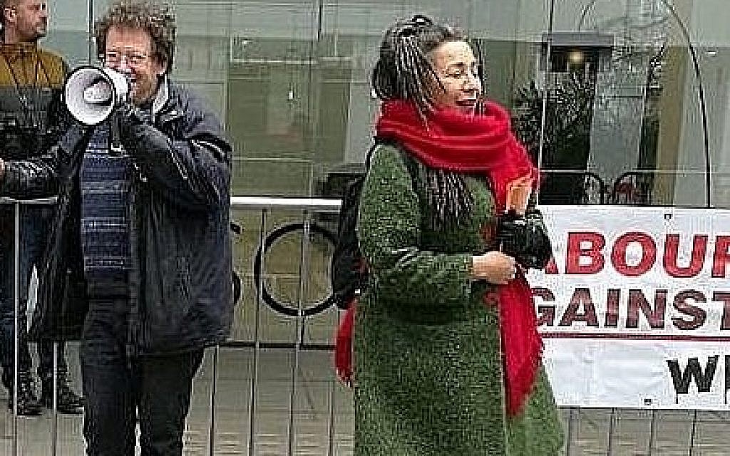 Jackie Walker (right) with Tony Greenstein (left) in front of a Momentum banner outside the Labour Party's HQ