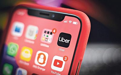 The Uber application is seen on an iPhone in this photo illustration on January 29, 2019. (Photo by Jaap Arriens / Sipa USA)