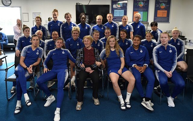 Susan Pollack (centre) with Chelsea Women players, as they heard testimony from the 88-year-old survivor this week.
