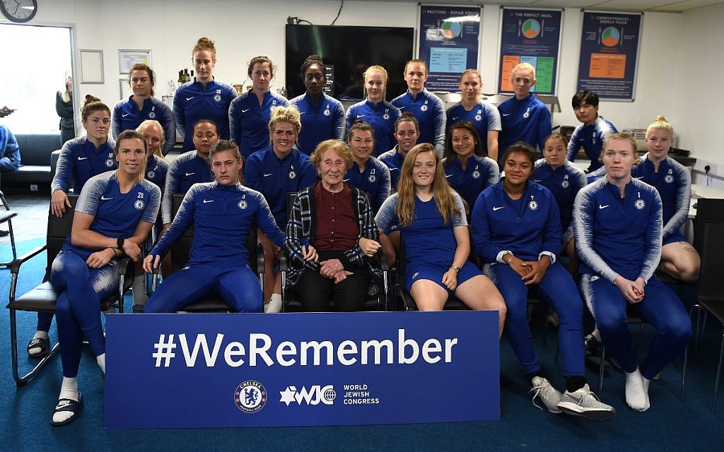 Susan Pollack (centre) with Chelsea Women players, as they heard testimony from the 88-year-old survivor this week.