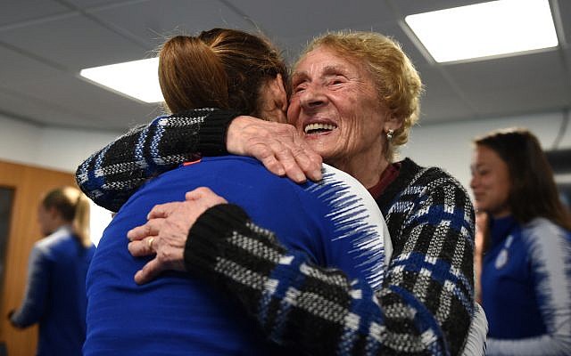Susan embraces a player from the Chelsea Women team, after they heard testimony from the 88-year-old survivor this week.