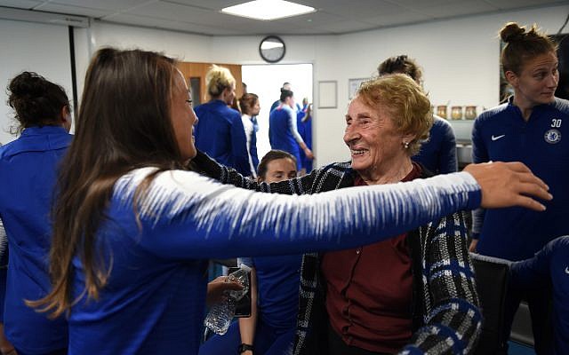 Susan embraces a player from the Chelsea Women team, after they heard testimony from the 88-year-old survivor this week.