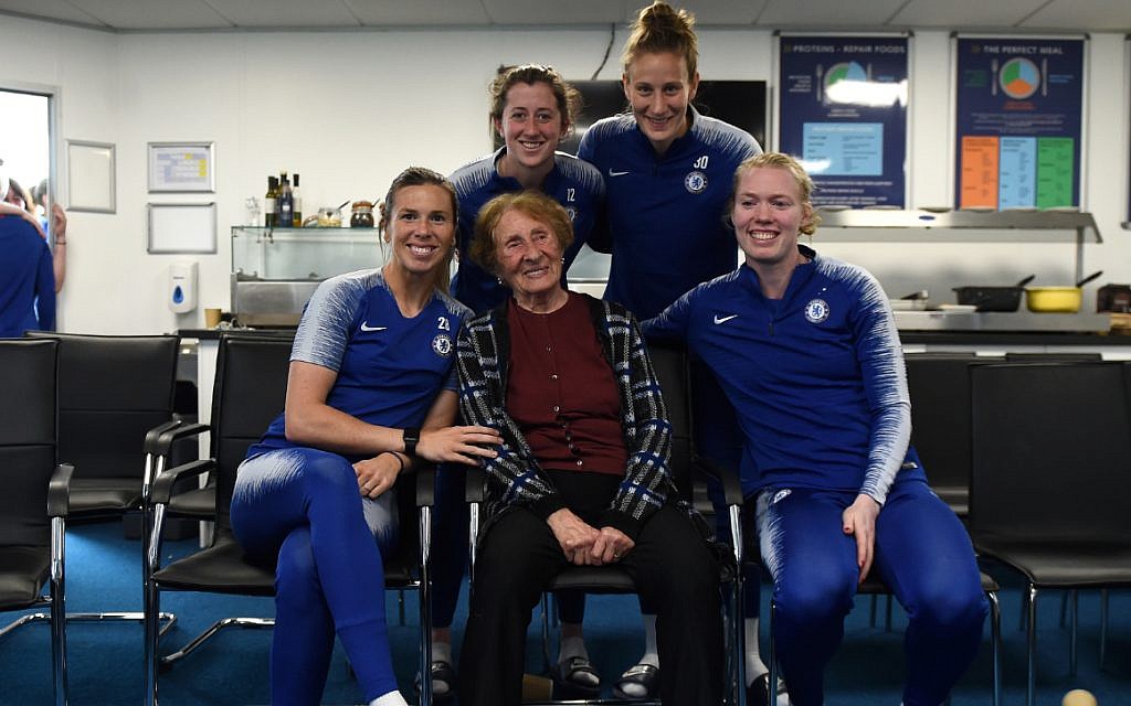 Susan Pollack (centre) with Chelsea Women players, as they heard testimony from the 88-year-old survivor this week.