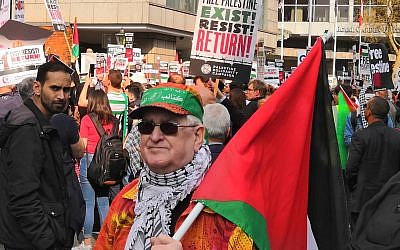 Pro-Palestine demonstrator with questionable bandanna
