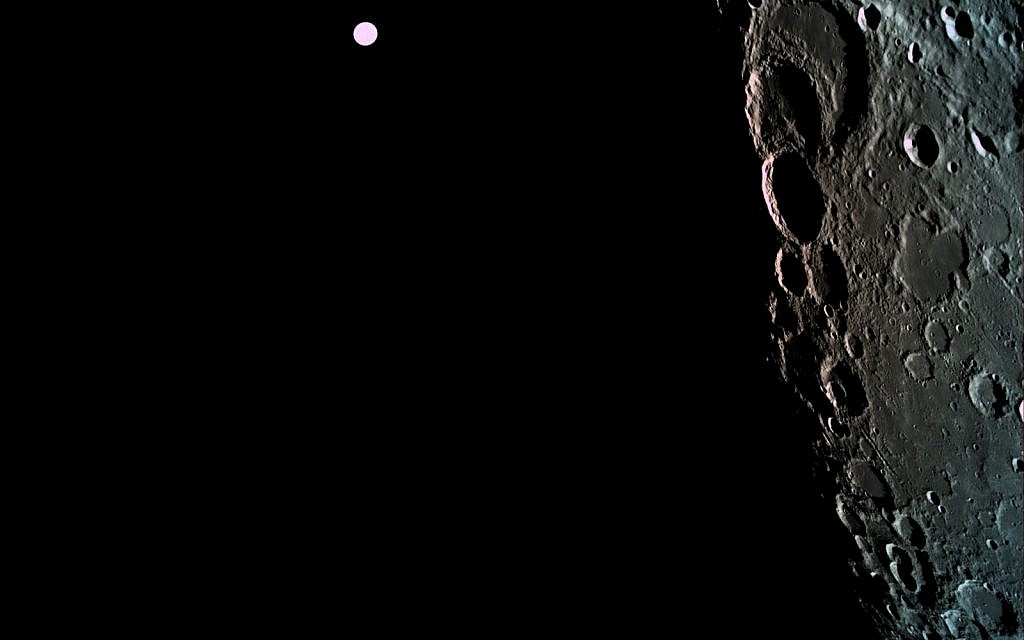 A picture of the far side of the moon with Earth in the background- also at 470 km from the moon. 

(Photo credit: Eliran Avital)