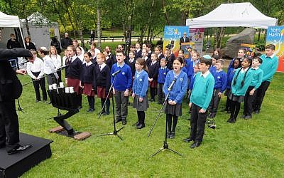 Mixed school choir led by  Stephen Melzack at The Dell in Hyde Park. Photo: John Rifkin