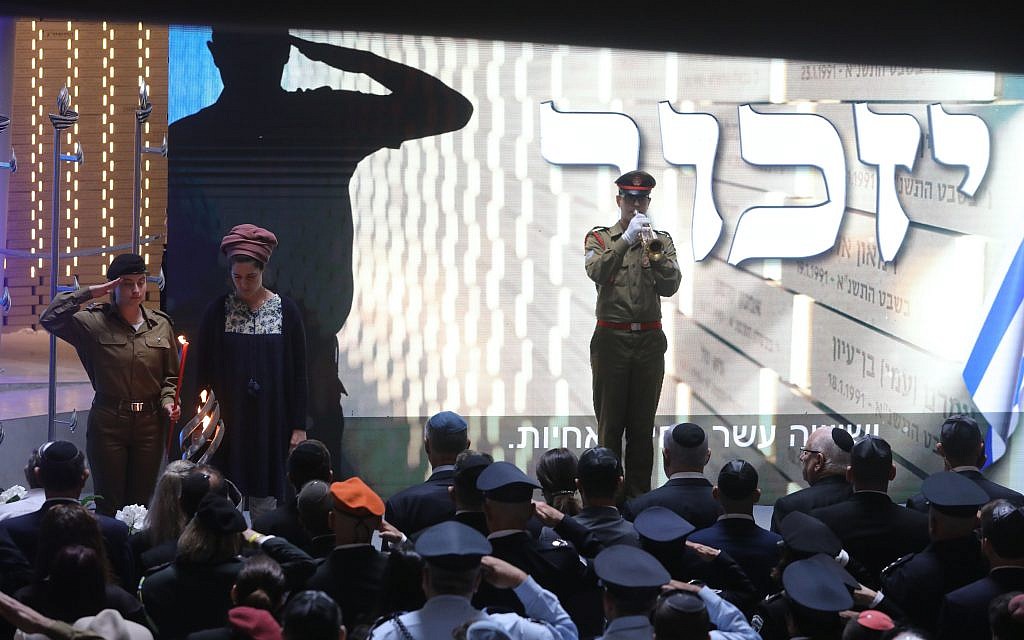 Israeli soldiers and civilians take part in a ceremony on Memorial Day, when Israel commemorates its fallen soldiers, at Mount Herzl in Jerusalem May 8, 2019. Photo by: Marc Israel Sellem-JINIPIX