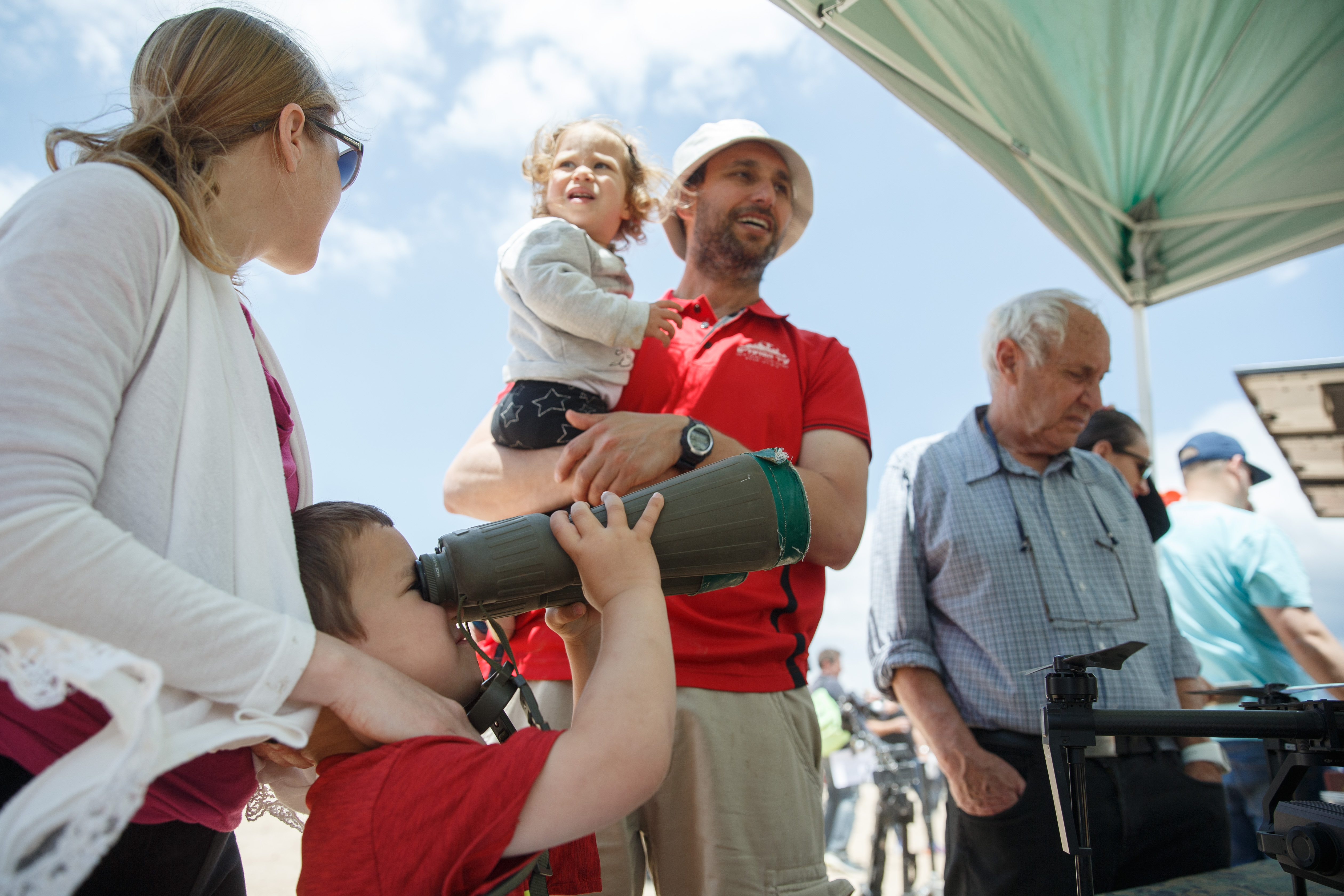 Children in an exhibit of Israeli military weapons during the celebration of the 71st Independence Day near the northern city of Kiryat Shmona, May 9, 2019. Photo by: JINIPIX
