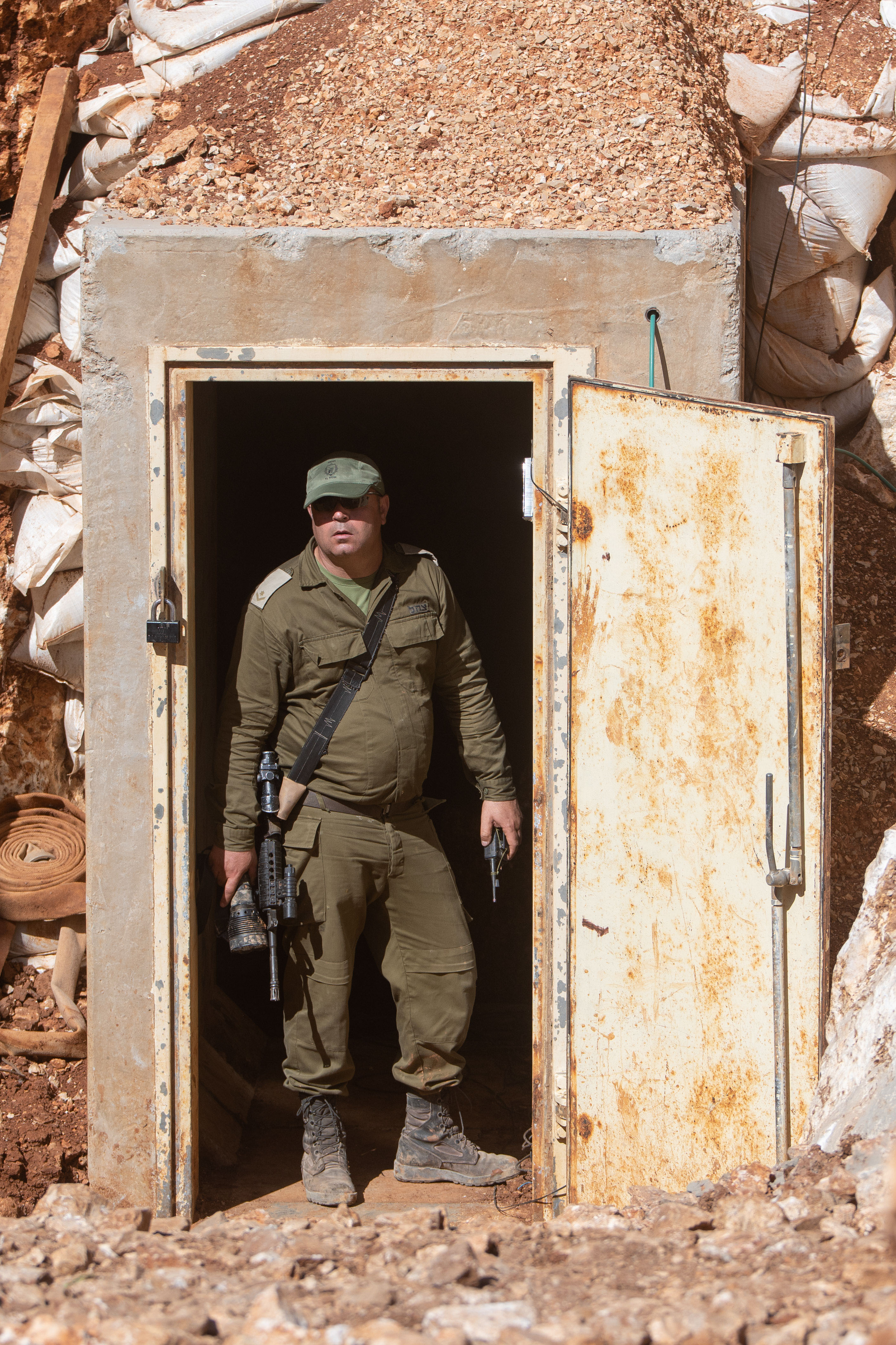 An Israeli soldier stands at the enterance of a Hezbollah tunnel that crosses from Lebanon to Israel, on the border between Israel and Lebanon in northern Israel, on May 29, 2019. Photo by: Ayal Margolin-JINIPIX