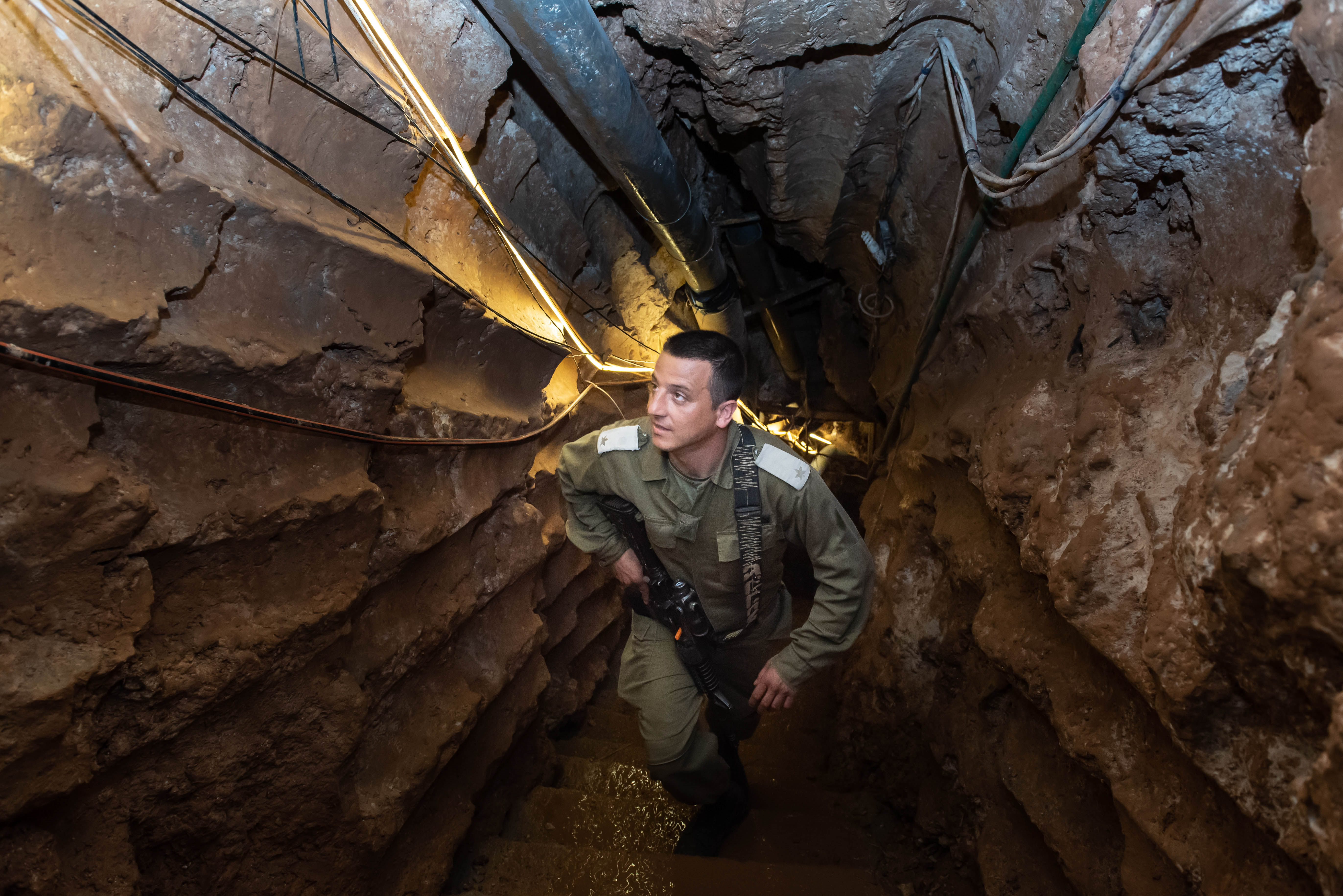 An Israeli soldier stands at a Hezbollah tunnel that crosses from Lebanon to Israel, on the border between Israel and Lebanon in northern Israel, on May 29, 2019. Photo by: Ayal Margolin-JINIPIX