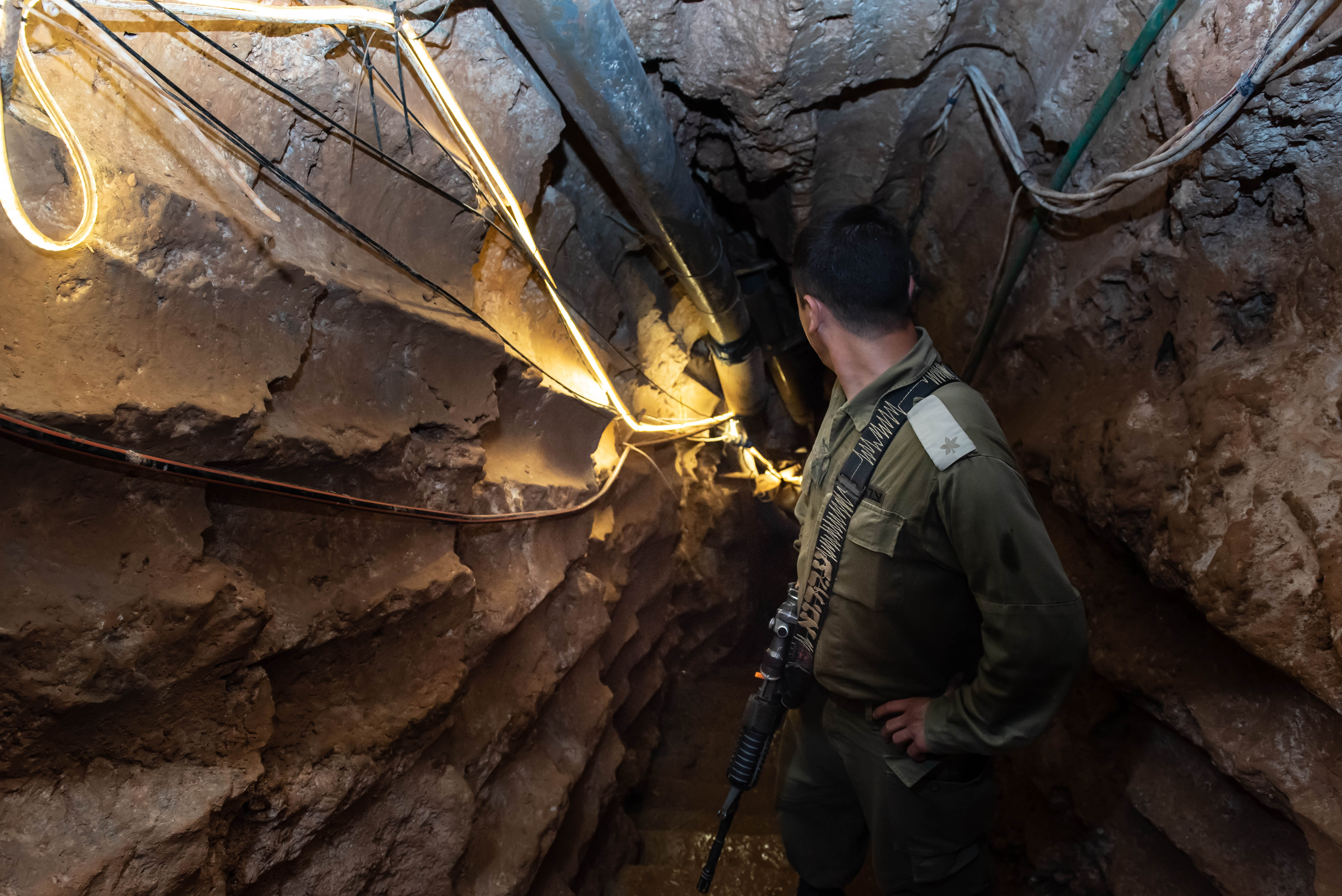 An Israeli soldier stands at a Hezbollah tunnel that crosses from Lebanon to Israel, on the border between Israel and Lebanon in northern Israel, on May 29, 2019. Photo by: Ayal Margolin-JINIPIX