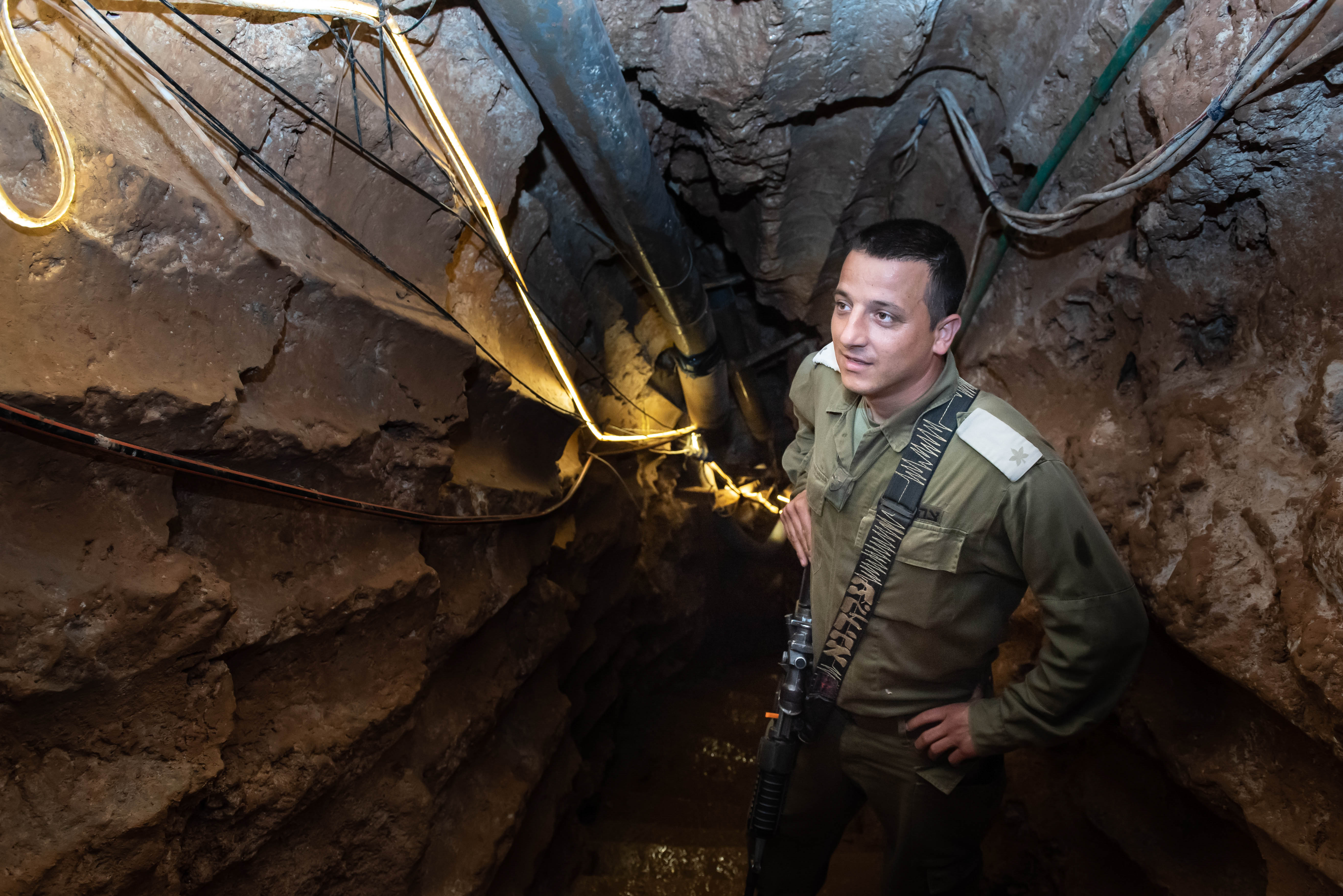 An Israeli soldier stands at a Hezbollah tunnel that crosses from Lebanon to Israel, on the border between Israel and Lebanon in northern Israel, on May 29, 2019. Photo by: Ayal Margolin-JINIPIX