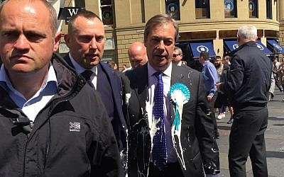 Nigel Farage after he was doused in milkshake during a campaign walkabout in Newcastle.  Photo credit: Tom Wilkinson/PA Wire