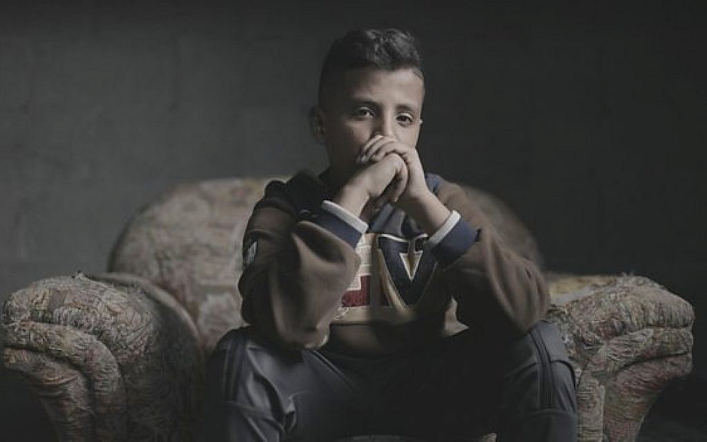 Pictured: Mohammed Sheikh Khalil (12), brother of Wessal Sheikh Khalil (14) who was shot in the head and killed