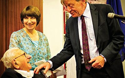 Lord Alf Dubs (right) meets with Sir Nichols Winton and his daughter Barbara in 2014.