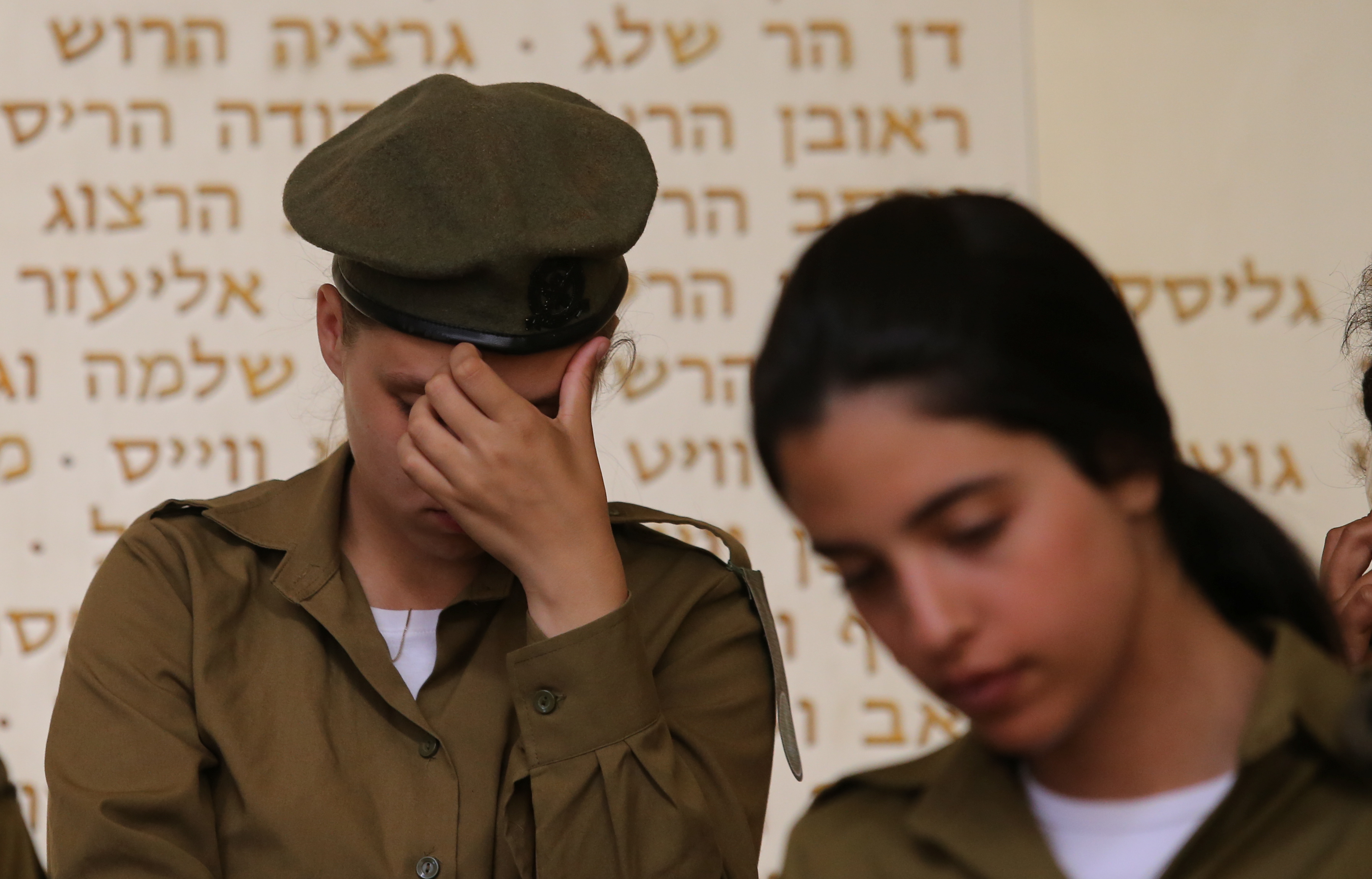 Israeli soldiers at the Yom Hazikaron ceremony (Photo by: Alex Kolomoisky-POOL-JINIPIX)