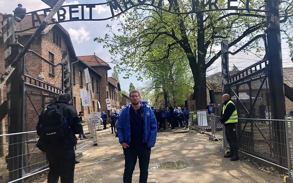 Noam Mirvis at the infamous gates of Auschwitz