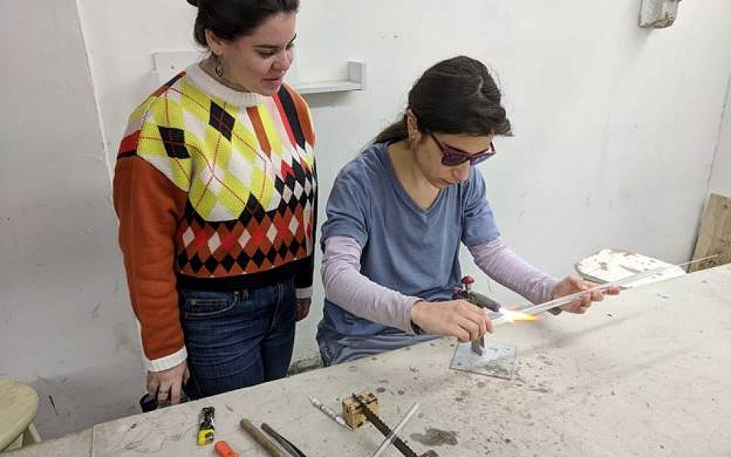 Shi Lowidt, a second year Ceramics and Glass Design student at Bezalel Academy of Arts and Design Jerusalem, works with Linda Meripeled, a student at The Gerrit Rietveld Academie in Amsterdam, on an “alternative mezuzah” during Bezalel Academy’s International Week program.
