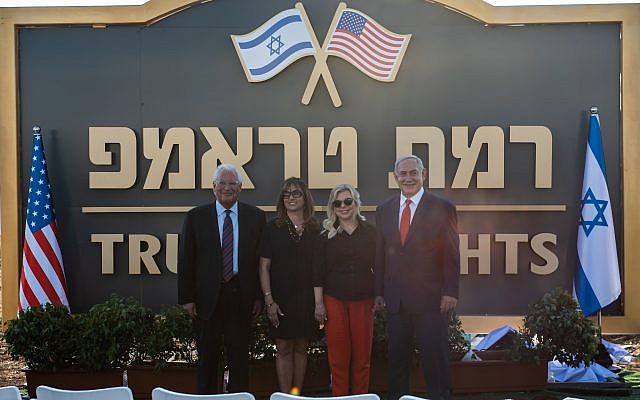 US Ambassador to Israel David Friedman (L) and his wife Tammy (2-L) and the Israeli Prime Minister Benjamin Netanyahu (R) and his wife Sara (2-R) during the unveiling of the sign of the new settlement that approved by the Israeli cabinet earlier today and will be called 'Trump Heights', during an official ceremony in Bruchim-Kela Alon Golan Heights, 16 June 2019. After a festive cabinet that held in Bruchim-Kela Alon , Netanyahu cabinet approved the building of a new settlement in the Golan Heights which is to be named after US President Trump over his unilateral recognition of Israeli sovereignty over the Golan Heights. Israel takeover the Golan Heights during the six days war between Israel and Syria in 1967, and annexed to Israel in 1981. Photo by: Ayal Margolin-JINIPIX