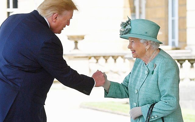 Queen Elizabeth II greets US President Donald Trump as he arrives for the Ceremonial Welcome at Buckingham Palace, London, on day one of his three day state visit to the UK. Photo credit: Victoria Jones/PA Wire