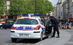 Police car in Paris (Credit: Andre Bulber, Flickr)