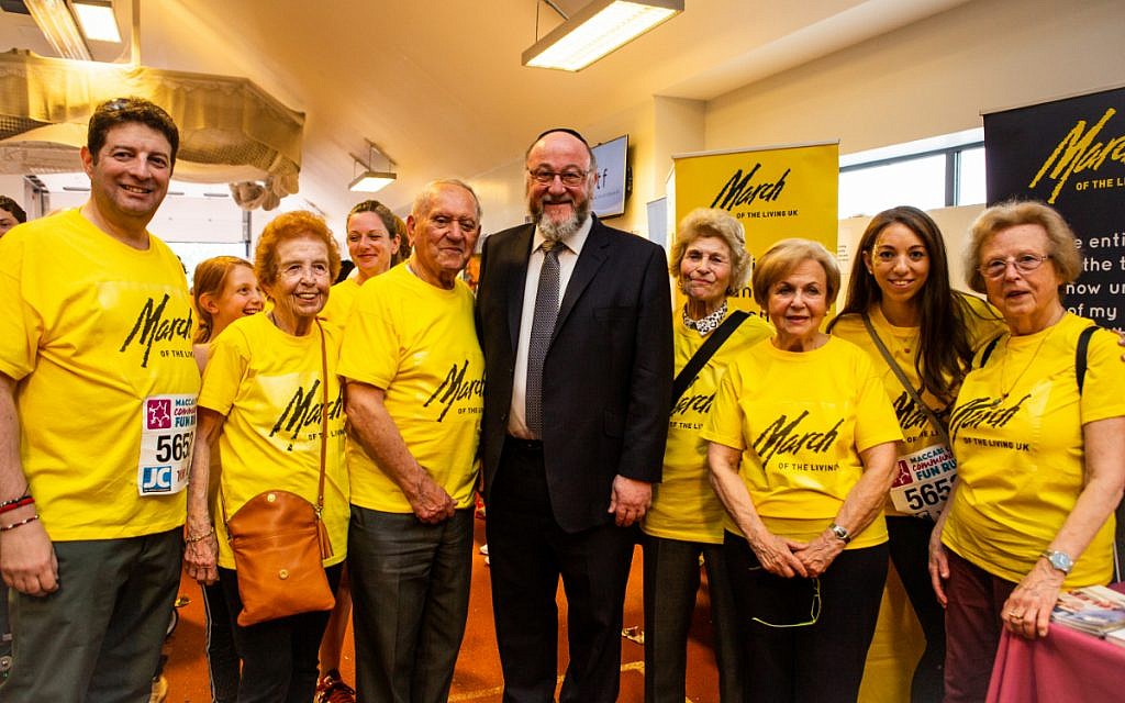 Left to Right are: Scott Saunders (Chairman, March of the Living UK), Eve Kugler, Arek Hersh, Chief Rabbi, Jean Hersh, Mala Tribich, Cassie Matus (CEO, March of the Living UK), Agnes Kaposki. (Blake Ezra Photography)