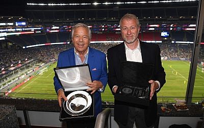 Robert Kraft (left) and Roman Abramovich (right) at the charity match in Boston to raise funds to fight antisemitism.