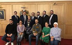 United Synagogue rabbis David Mason, Nicky Liss, Marc Levene, Yoni Birnbaum, Ephraim Guttentag, and Sam Taylor, with refugees Alyaa, Hafssa, Martin, Ahmad and Sara