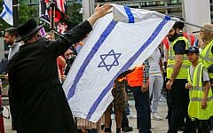 Protesters burn a flag of Israel during the Al Quds Day rally. (Photo by Dinendra Haria / SOPA Images/Sipa USA) Protesters burn a flag of Israel during the Al Quds Day rally. (Photo by Dinendra Haria / SOPA Images/Sipa USA)