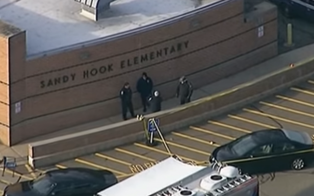 Police arrive at Sandy Hook Elementary, after the shooting on December 14, 2012. (Wikipedia/Youtube/Voice of America - https://www.youtube.com/watch?v=gAmr-A-F8K8)