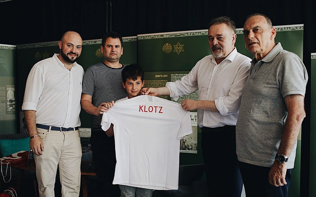 Left to Right Director of From The Depths Jonny Daniels, Yoav and Eitan Dekel, Director of the the Polish Football association PZPN Janusz Basalajand Mr. Avram Grant. . (photo credit: From the Depths)