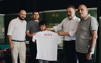 Left to Right Director of From The Depths Jonny Daniels, Yoav and Eitan Dekel, Director of the the Polish Football association PZPN Janusz Basalajand Mr. Avram Grant. . (photo credit: From the Depths)