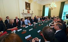 (from left, seated at table) International Trade Secretary Liz Truss, Health and Social Care Secretary Matt Hancock, Cabinet Secretary Sir Mark Sedwill, Prime Minister Boris Johnson, Chancellor of the Exchequer Sajid Javid, Works and Pensions Secretary and Minister for Women Amber Rudd, Housing, Communities and Local Government Secretary Robert Jenrick, Transport Secretary Grant Shapps, Scottish Secretary Alister Jack, Culture Scretary Nicky Morgan, Chief Secretary to the Treasury Rishi Sunak, and Chief Whip Mark Spencer, as Prime Minister Boris Johnson holds his first Cabinet meeting at Downing Street in London. (Photo credit: Aaron Chown/PA Wire) (from left, seated at table) International Trade Secretary Liz Truss, Health and Social Care Secretary Matt Hancock, Cabinet Secretary Sir Mark Sedwill, Prime Minister Boris Johnson, Chancellor of the Exchequer Sajid Javid, Works and Pensions Secretary and Minister for Women Amber Rudd, Housing, Communities and Local Government Secretary Robert Jenrick, Transport Secretary Grant Shapps, Scottish Secretary Alister Jack, Culture Scretary Nicky Morgan, Chief Secretary to the Treasury Rishi Sunak, and Chief Whip Mark Spencer, as Prime Minister Boris Johnson holds his first Cabinet meeting at Downing Street in London. (Photo credit: Aaron Chown/PA Wire)