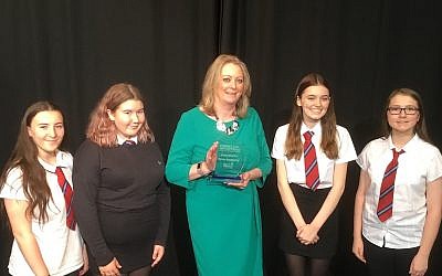 Dyce Academy accepting the honour from Yad Vashem. (Credit: Aberdeen City Council on twitter)