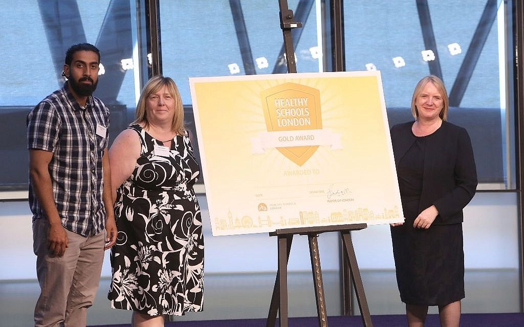 L-R: Simon Marks Primary teacher Syed Gilani, learning mentor Jackie Osborne, with Deputy Mayor for Education and Childcare Joanne McCartney
