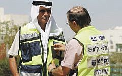 Zaka Bedouin and Jewish volunteers working together Zaka Bedouin and Jewish volunteers working together