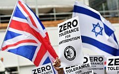 Antisemitism signs during a protest in 2019. (Dominic Lipinski/PA Wire)
