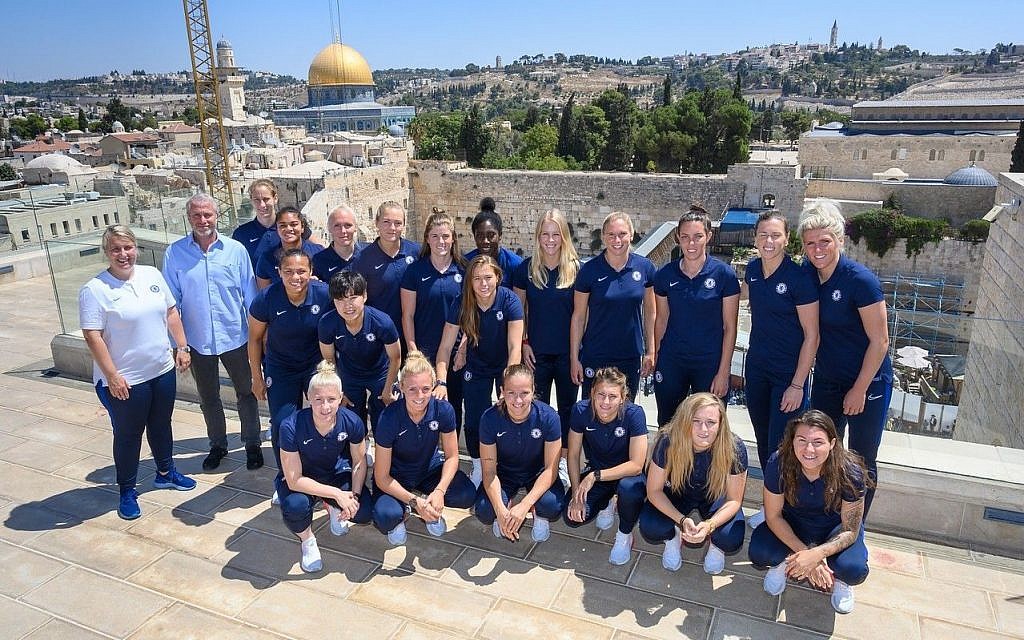 Photo of Chelsea Women players posing for a photo with Chelsea owner Roman Abramovich in Jerusalem, Israel. (Photo credit: Shahar Azran/Chelsea Football Club/PA Wire.
