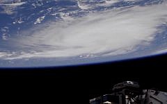 This Thursday, Aug. 29, 2019 image provided by NASA shows a view of Hurricane Dorian from the International Space Station as it churned over the Atlantic Ocean north of Puerto Rico.     (NASA via AP)