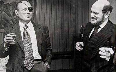 Geoffrey Paul (right) with Moshe Dayan at the JC offices in 1977 (Credit: The Jewish Chronicle)