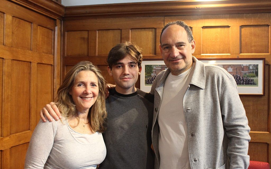 Oliver Russell with his proud parents